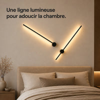 Applique murale chambre LED linéaire allumée au-dessus d'une tête de lit